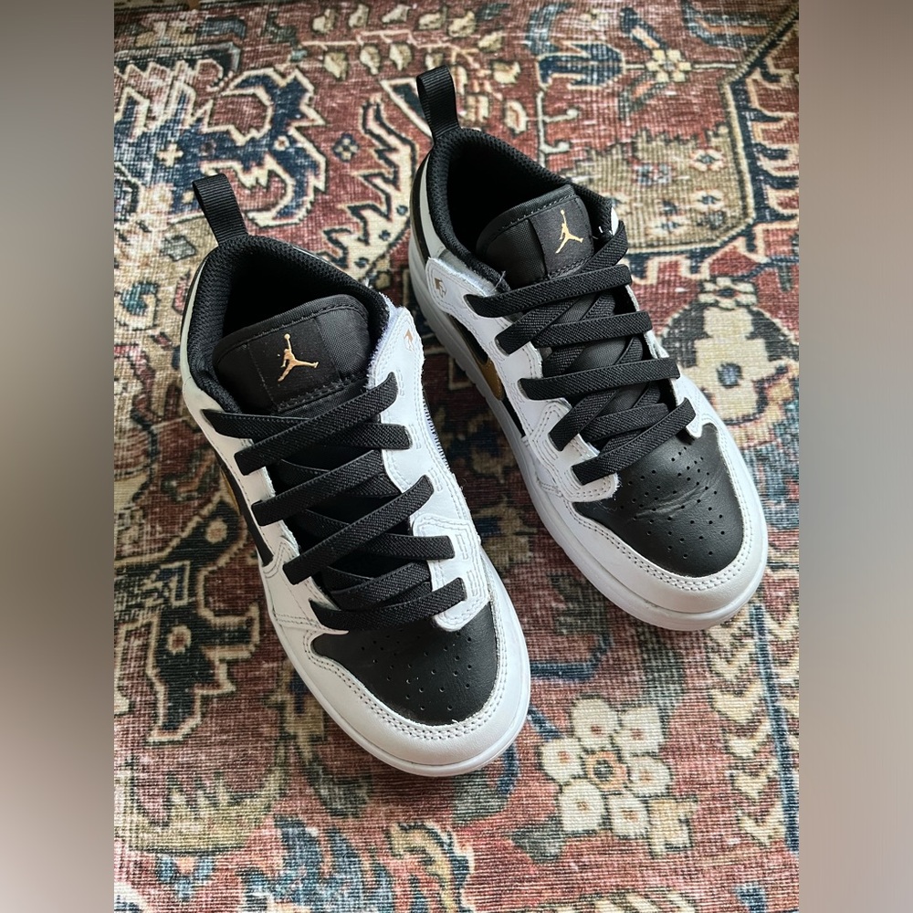 Nike Kids Black and White Sneakers with Gold Jumpman